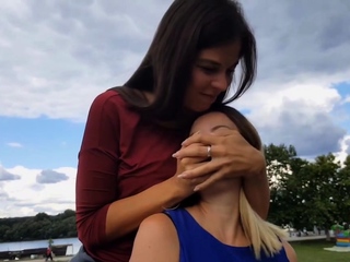 Pale blonde and tanned brunette lesbians toying and licking